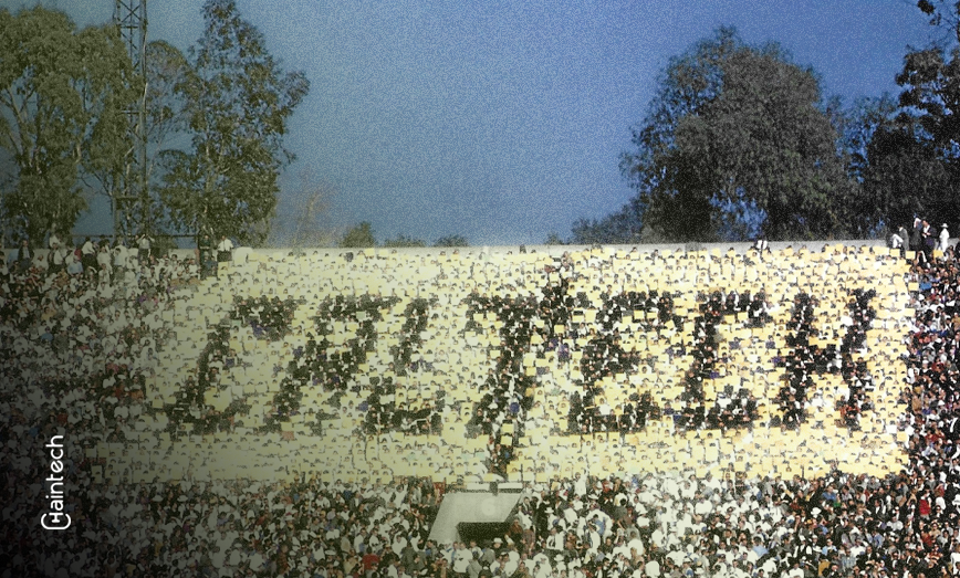 A stadium scene with flip cards spelling out the word 'Caltech' - representing the 1961 Rose Bowl Hoax